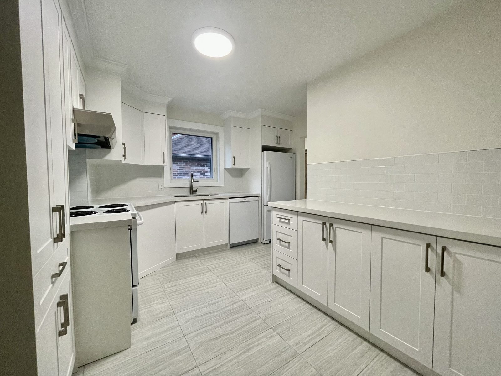 Compact white kitchen renovation